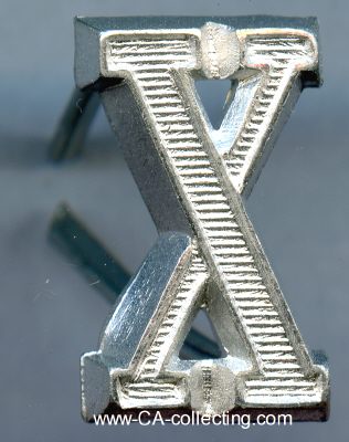 1 SCHULTERKLAPPEN-ZIFFER 'X'. Aluminium. 19mm. An der...