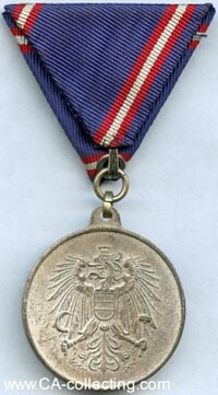SILVERED MILITARY SERVICE COMMEMORATIVE MEDAL.
