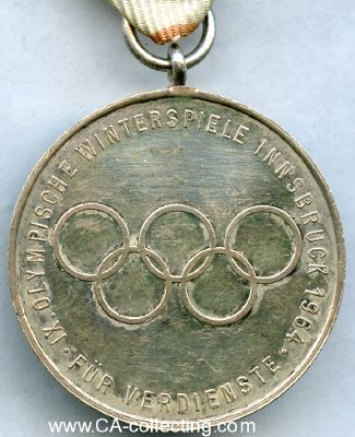Foto 2 : OLYMPIA-VERDIENSTMEDAILLE 1964. Bronze versilbert. 35mm...
