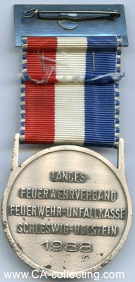 Foto 2 : FREIWILLIGE FEUERWEHR WEWELSFLETH. Medaille 1988....