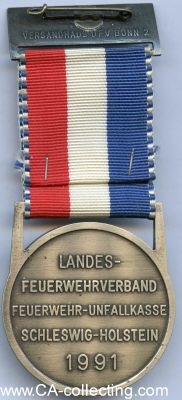 Foto 2 : FREIWILLIGE FEUERWEHR SEESTERMÜHE. Medaille 1991....