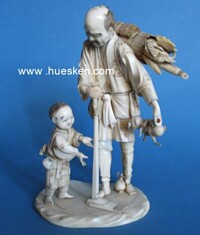 CARVED IVORY GINSENG FARMER WITH CHILD OKIMONO