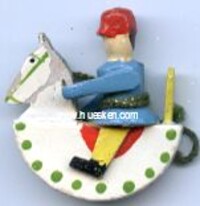 ROCKING HORSE WITH RIDER.