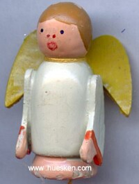LITTLE DOLL WITH FIXED ARMS.
